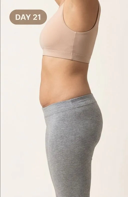 Day 21: the same woman, flatter belly, photographed without the brief